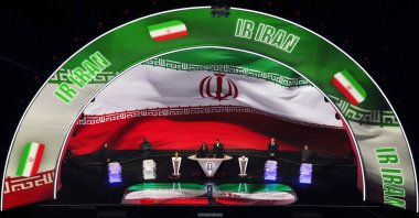 Draw assistant Shaquille O’Neal pulls a team, including Iran, during the FIFA World Cup 2026 draw at the John F. Kennedy Center for the Performing Arts, Washington, U.S., Dec. 5, 2025. (Reuters Photo)