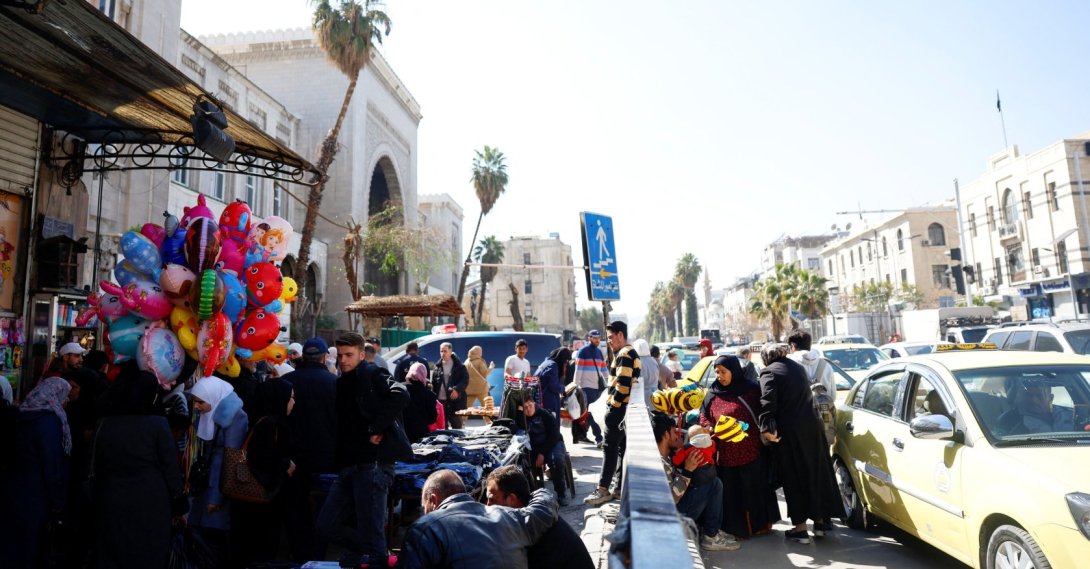 People buy clothes in preparation for Eid al-Fitr, in a market, Damascus, Syria, March 17, 2026. (Reuters Photo)