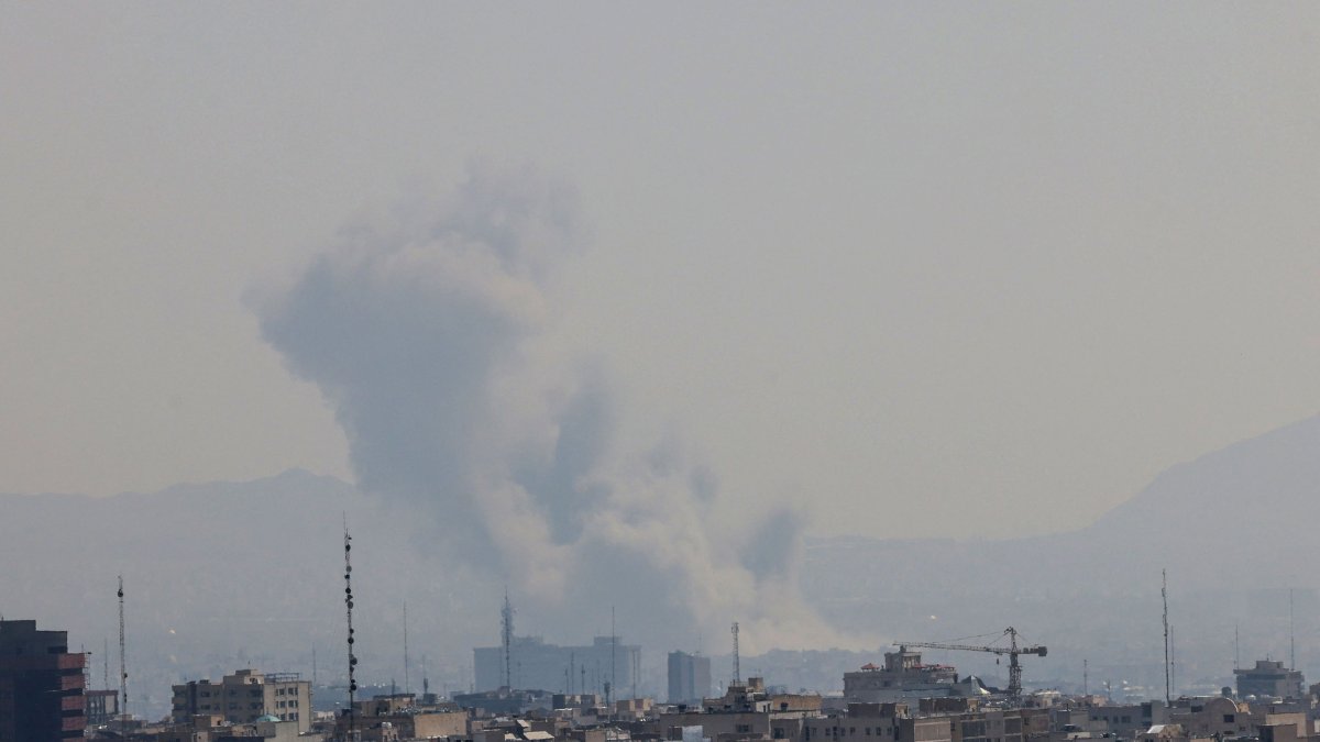 A plume of smoke rises from the site of a strike in Tehran, Iran, March 17, 2026. (AFP Photo)