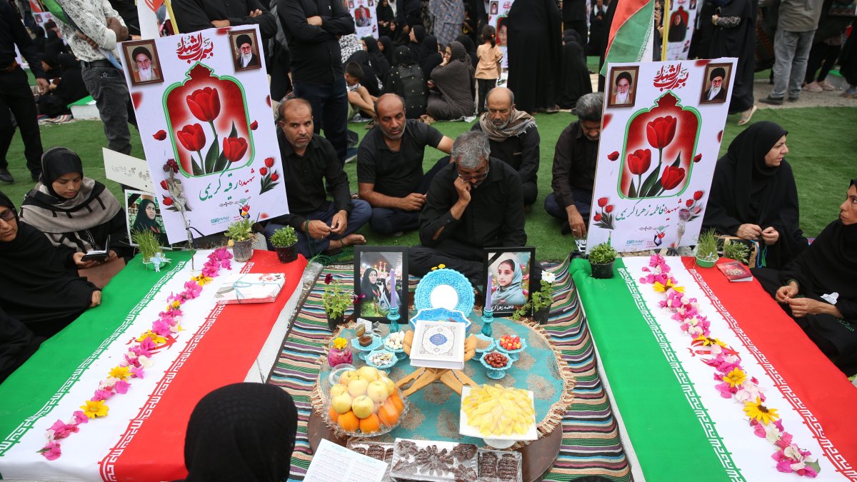 Iranians gather at graves to mourn victims of a deadly strike on a primary school during Nowruz celebrations in Minab, southern Hormozgan province, Iran, March 20, 2026. (AA Photo)