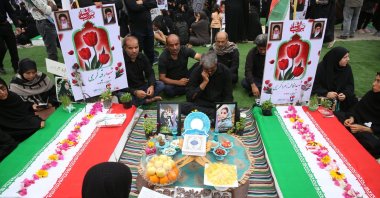 Iranians gather at graves to mourn victims of a deadly strike on a primary school during Nowruz celebrations in Minab, southern Hormozgan province, Iran, March 20, 2026. (AA Photo)