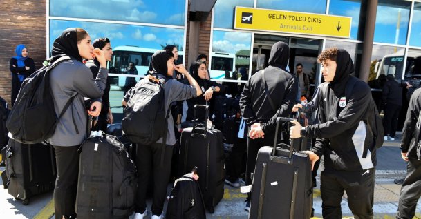 Members of the Iranian women's national football team outside the airport, Iğdır, Türkiye, March 18, 2026. (Reuters Photo)