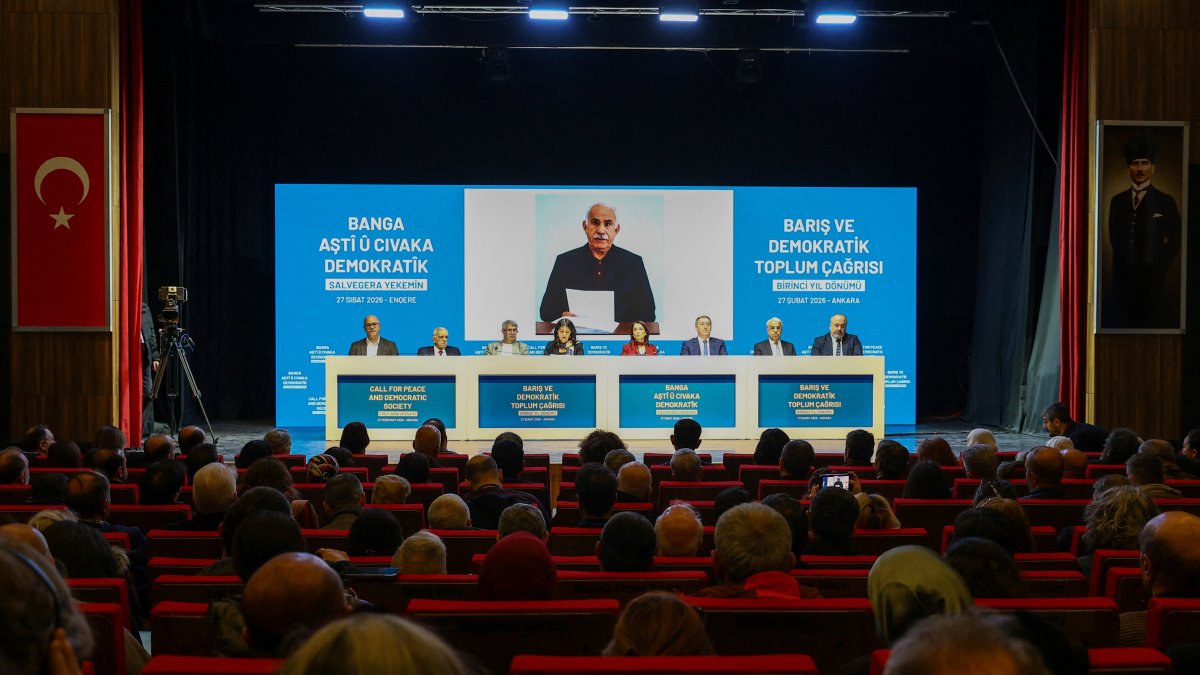 Lawmakers from a pro-PKK party attend a news conference backdropped by a picture of the PKK's jailed leader, Abdullah Öcalan, Ankara, Türkiye, Feb. 27, 2026. (Reuters Photo)