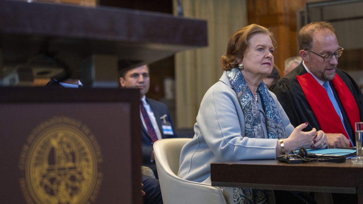 Tania von Uslar-Gleichen, Germany's legal adviser (L), and member of Germany's legal team, Christian J. Tams (R) wait for judges to enter the International Court of Justice where the court is ruling on a request by Nicaragua to order Germany to halt military aid to Israel, arguing that Berlin's support enables acts of genocide, in The Hague, Netherlands, April 30, 2024. (AP File Photo)