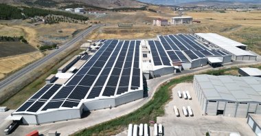 An aerial view of solar panels installed on a rooftop of a company, Antalya, southern Türkiye, March 5, 2026. (IHA Photo)