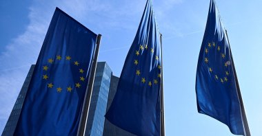 European Union flags flutter outside the European Central Bank (ECB) headquarters in Frankfurt, Germany, March 19, 2026. (Reuters Photo)