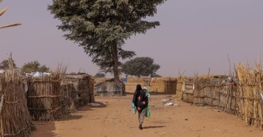 Sudanese refugees walk through a refugee camp in Adre, Chad, Feb. 19, 2026. (Getty Images)
