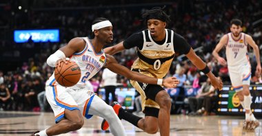 Thunder guard Shai Gilgeous-Alexander (L) drives as Wizards guard Bilal Coulibaly during an NBA game in Washington, D.C., U.S., Mar 21, 2026. (Reuters Photo) 