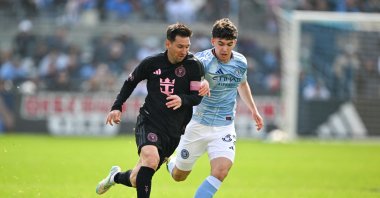 Inter Miami forward Lionel Messi (L) runs with the ball while chased by New York City FC midfielder Jonathan Shore during the second half at Yankee Stadium, New York City, U.S., March 22, 2026. (Reuters Photo)