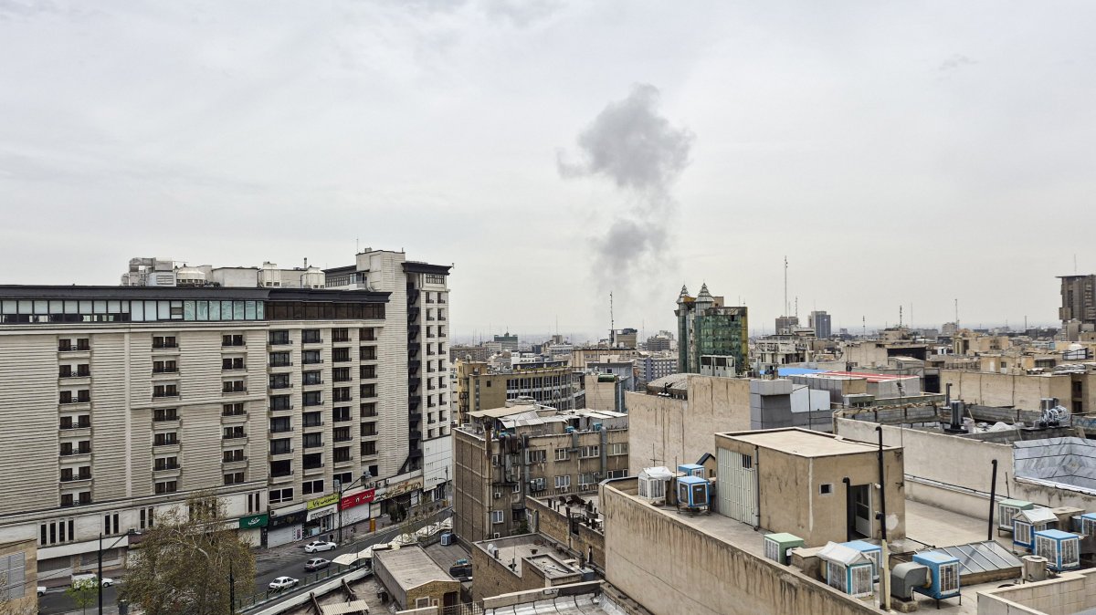 Plume of smoke rises above the skyline after an Israeli airstrike on central Tehran, Iran, March 23, 2026. (AA Photo)