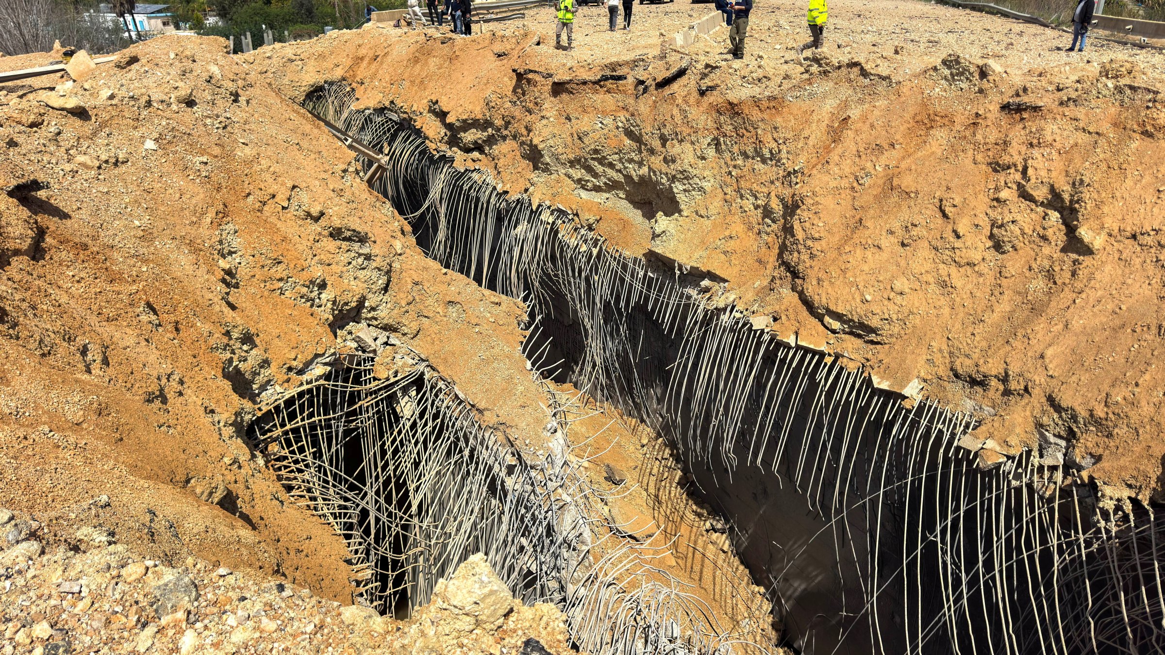A damaged bridge following an Israeli strike near Qasmiyeh, Lebanon, March 23, 2026. (Reuters Photo)
