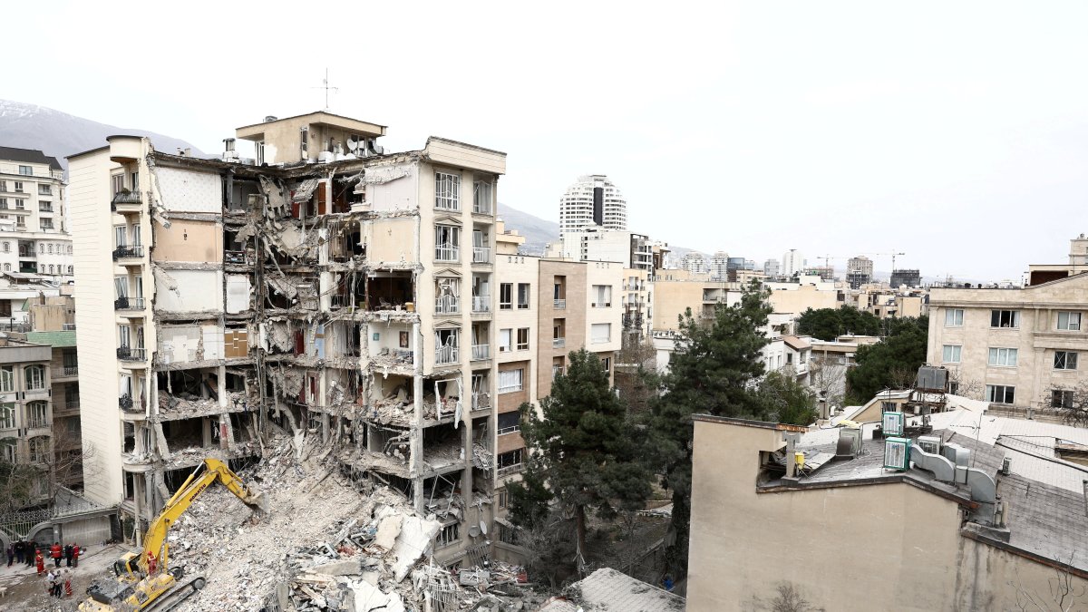 A view of a residential building that was damaged by a strike, amid the U.S.-Israeli conflict with Iran, in Tehran, Iran, March 23, 2026. (Reuters via WANA Handout)