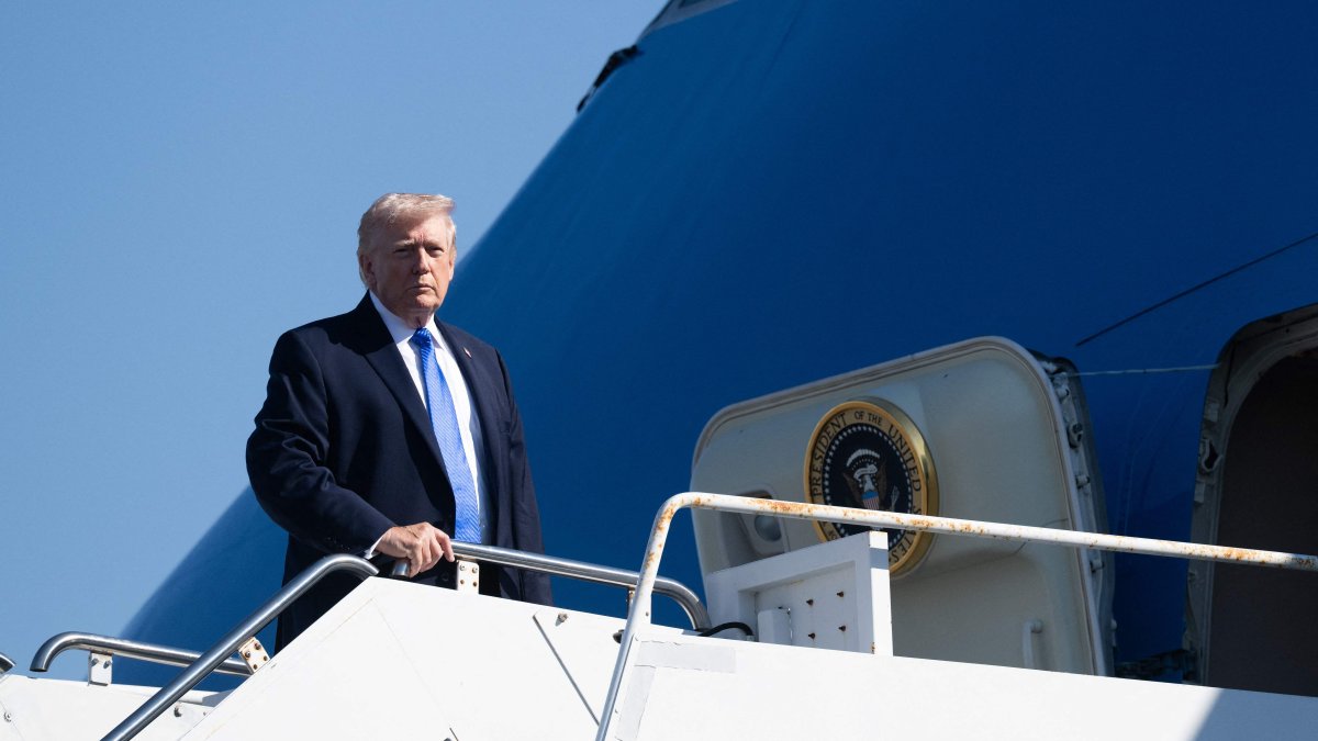 U.S. President Donald Trump boards Air Force One prior to departure from Palm Beach International Airport in West Palm Beach, Florida, U.S., March 23, 2026. (AFP Photo)