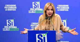 Italy's Prime Minister Giorgia Meloni speaks during a campaign meeting of Italian right wing party Brothers of Italy (Fratelli d'Italia) (Fdi) to support the "Yes" to Justice referendum, in Milan on March 12, 2026. (AFP Photo)