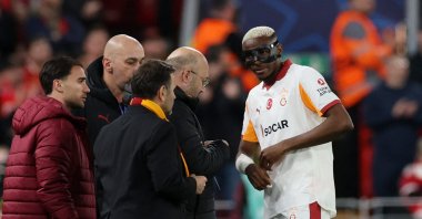 Galatasaray's Victor Osimhen receives medical attention after sustaining an injury during the Champions League round 16 second leg against Liverpool at Anfield, Liverpool, U.K., March 18, 2026. (Reuters Photo)