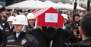 Honor guards carry the coffins of martyrs at the funeral prayers, Ankara, Türkiye, March 23, 2026. (İHA Photo)