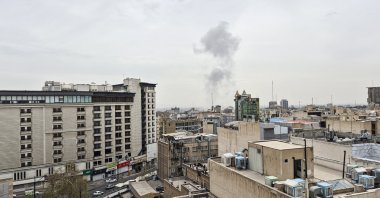 Plume of smoke rises above the skyline after an Israeli airstrike on central Tehran, Iran, March 23, 2026. (AA Photo)