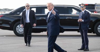 U.S. President Donald Trump gives a thumbs up after disembarking Air Force One at Palm Beach International Airport in West Palm Beach, Florida, U.S., March 20, 2026. (AFP Photo)