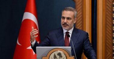 Foreign Minister Hakan Fidan speaks at a joint news conference with Qatari counterpart, Doha, March 19, 2026. (IHA Photo)