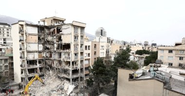 A view of a residential building that was damaged by a strike, amid the U.S.-Israeli conflict with Iran, in Tehran, Iran, March 23, 2026. (Reuters via WANA Handout)