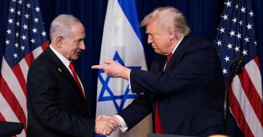 U.S. President Donald Trump points his finger towards Israeli Prime Minister Benjamin Netanyahu as they shake hands during a press conference after meeting at Trump’s Mar-a-Lago club in Palm Beach, Florida, U.S., Dec. 29, 2025. (Reuters Photo)