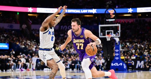 Los Angeles Lakers guard Luka Doncic (R) drives to the basket against Orlando Magic forward Jamal Cain during the first half at Kia Center, Orlando, U.S., March 21, 2026. (AFP Photo)
