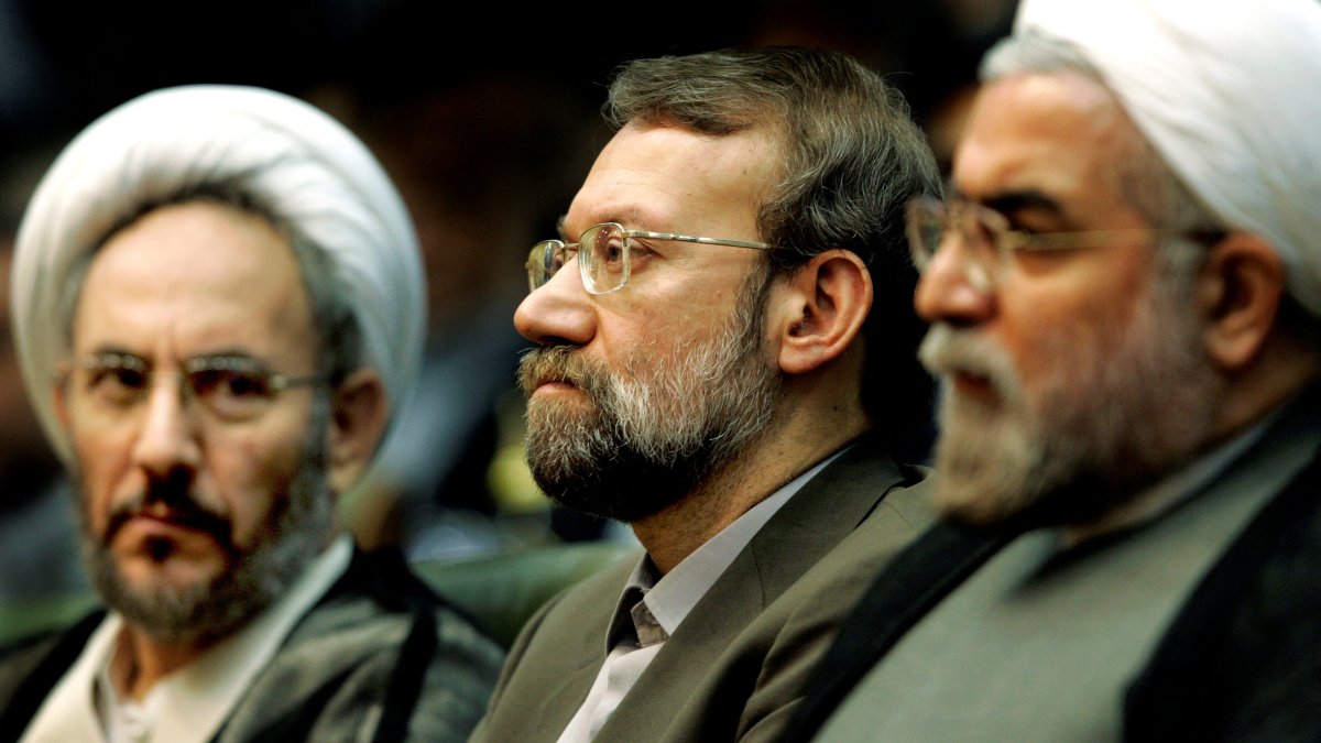 Iran's former Intelligence Minister Ali Younesi (L), chief nuclear negotiator Ali Larijani (C) and former President Hassan Rouhani attend a conference on Iran's Nuclear Policies and Prospects, Tehran, Iran, April 25, 2006. (Reuters File Photo)