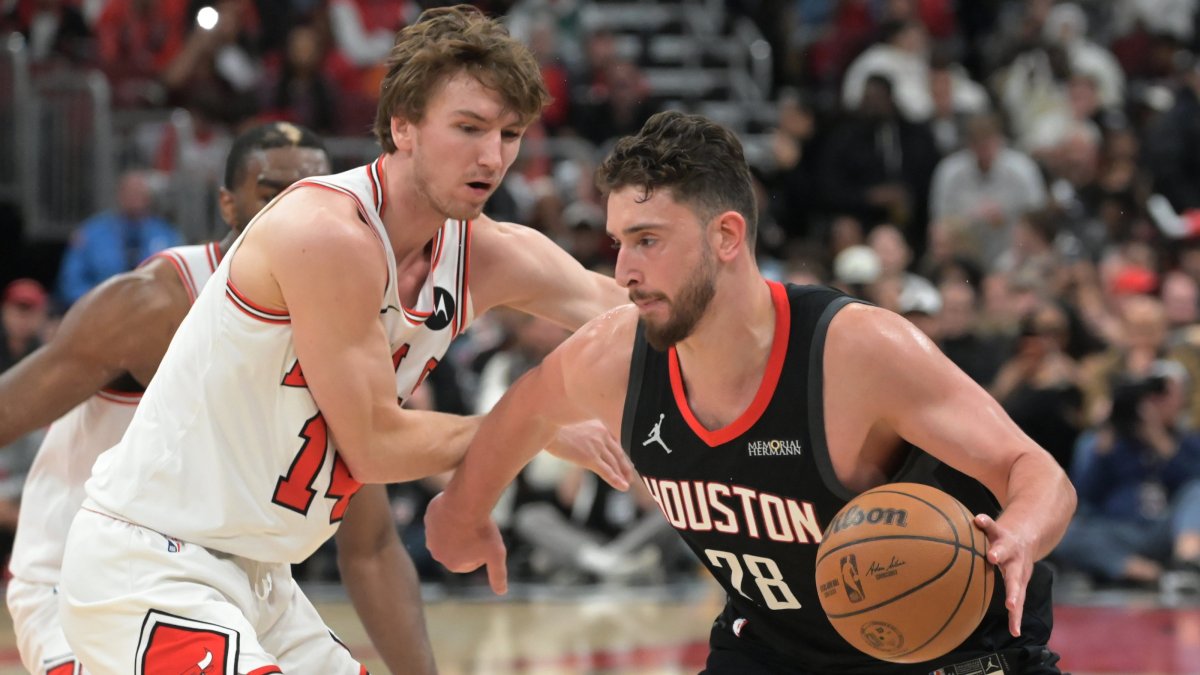 Houston Rockets center Alperen Şengün (R) battles opponents during the NBA game against the Chicago Bulls at United Center in Chicago, Illinois, U.S., March 23, 2026. (AA Photo)
