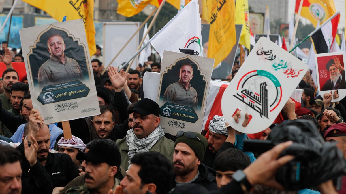 Members of Iraq's Iran-backed militia Hashd al-Shaabi, an alliance of factions now integrated into the regular army, take part in the funeral of its commander in al-Anbar, Saad Dawai, Baghdad, Iraq, March 24, 2026. (AFP Photo)