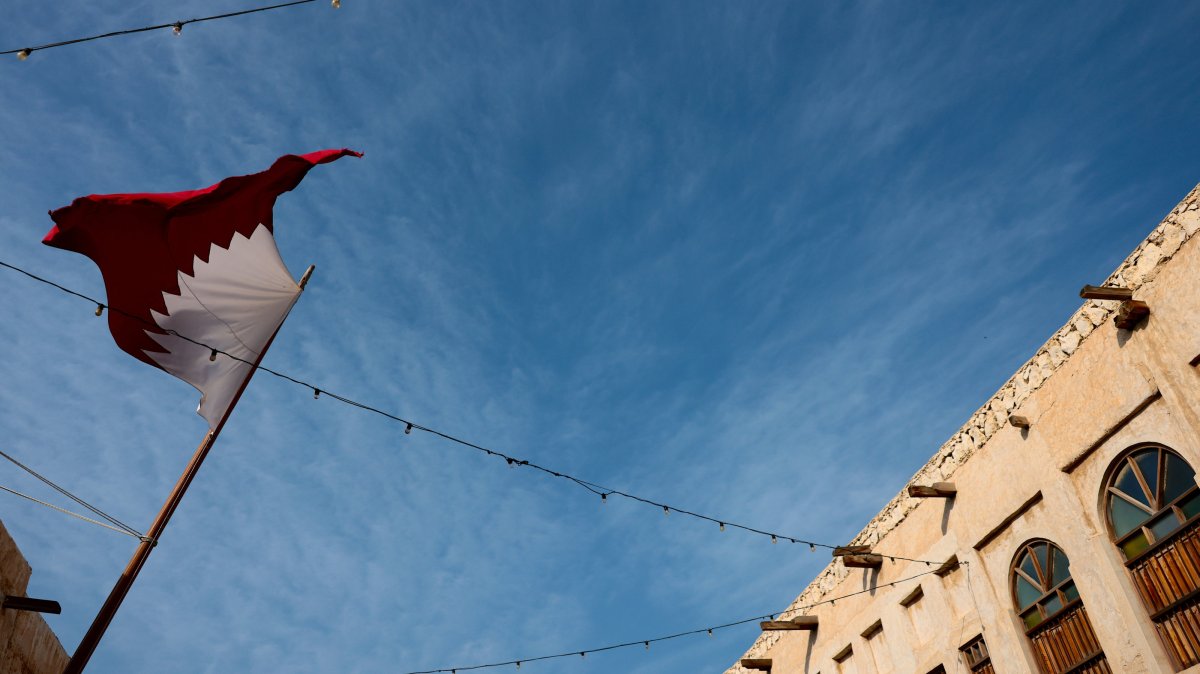 A Qatari national flag is seen at the old town city center in Doha, Qatar, March 1, 2026. (EPA Photo)