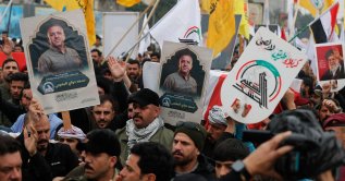 Members of Iraq's Iran-backed militia Hashd al-Shaabi, an alliance of factions now integrated into the regular army, take part in the funeral of its commander in al-Anbar, Saad Dawai, Baghdad, Iraq, March 24, 2026. (AFP Photo)