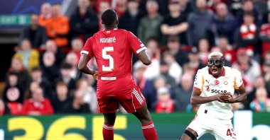 Galatasaray's Victor Osimhen (R) goes down injured during the UEFA Champions League round of 16 2nd-leg match between Liverpool and Galatasaray, Liverpool, U.K., March 18, 2026. (EPA Photo)