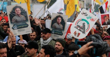 Members of Iraq's Iran-backed militia Hashd al-Shaabi, an alliance of factions now integrated into the regular army, take part in the funeral of its commander in al-Anbar, Saad Dawai, Baghdad, Iraq, March 24, 2026. (AFP Photo)