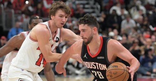 Houston Rockets center Alperen Şengün (R) battles opponents during the NBA game against the Chicago Bulls at United Center in Chicago, Illinois, U.S., March 23, 2026. (AA Photo)
