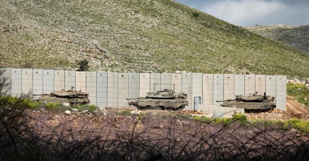 Israeli tanks are seen on the Israeli side of the border with Lebanon in the Upper Galilee in northern Israel, March 19, 2026. (AFP Photo)