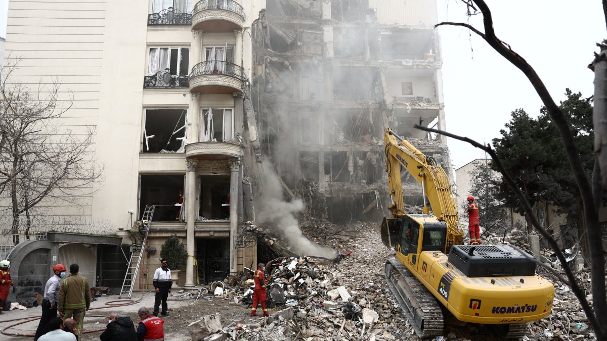 A view of a residential building damaged by a strike, amid the U.S.-Israeli conflict with Iran, Tehran, Iran, March 23, 2026. (Reuters Photo)