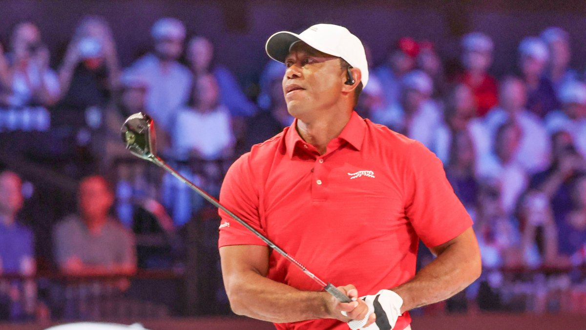 Tiger Woods of the Jupiter Links Golf Club plays his shot from the first tee during final day of TGL golf tournament, Palm Beach Gardens, U.S., March 24, 2026. (AP Photo)