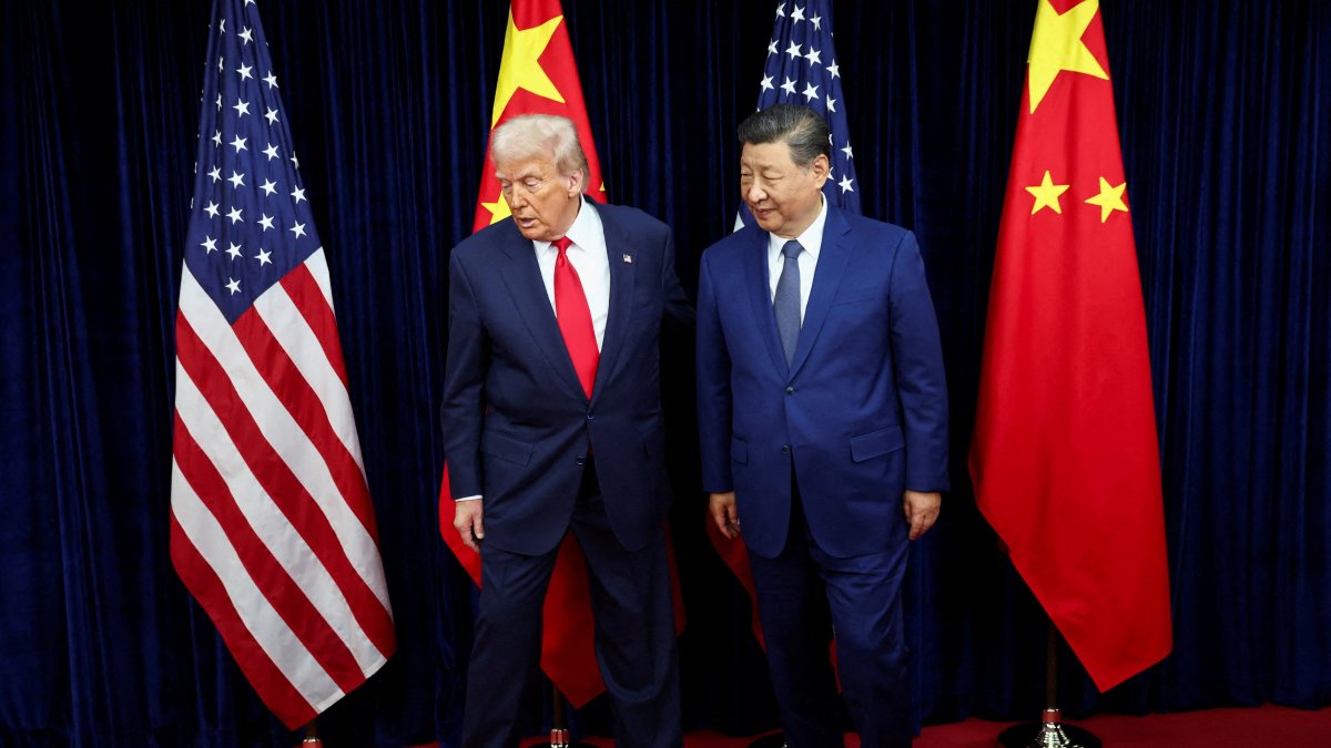 U.S. President Donald Trump and Chinese President Xi Jinping walk, as they hold a bilateral meeting at Gimhae International Airport on the sidelines of the Asia-Pacific Economic Cooperation (APEC) summit in Busan, South Korea, Oct. 30, 2025. (Reuters Photo)