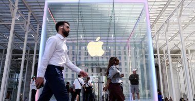 People walk by the Apple store on Fifth Avenue in New York City, U.S., May 1, 2025. (Reuters Photo)