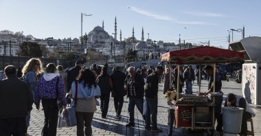People walk in the Eminönü neighborhood, Istanbul, Türkiye, Nov. 25, 2025. (EPA Photo)