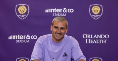 Antoine Griezmann poses for a photo as he signs a pre-contract to become an Orlando City player, Orlando, U.S., March 24, 2026. (IHA Photo)