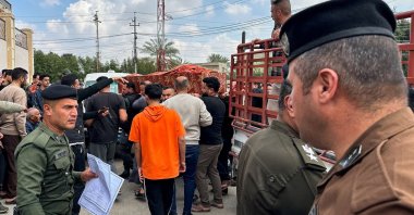 Relatives carry the coffin of an Iraqi soldier killed in an airstrike near an army medical centre in western Anbar, Iraq, March 25, 2026. (Reuters Photo)