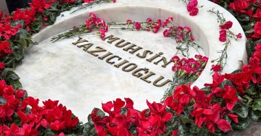 Muhsin Yazıcıoğlu’s grave is adorned with roses, Ankara, Türkiye, March 25, 2026. (IHA Photo)
