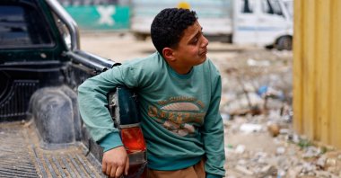 A mourner reacts during the funeral of Palestinians killed in an Israeli strike, in Nuseirat, central Gaza Strip, March 25, 2026. (Reuters Photo)
