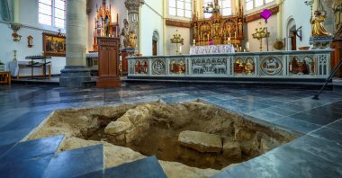 A view inside the Peter and Paul Church (Petrus en Pauluskerk) in Maastricht shows an excavation pit opened in the floor, where archaeologists believe they may have uncovered the skeletal remains of Charles de Batz de Castelmore, known as d’Artagnan, leader of King Louis XIV's musketeers, who died in 1673 during the French siege of the city, in Maastricht, Netherlands, March 25, 2026. (Reuters Photo)
