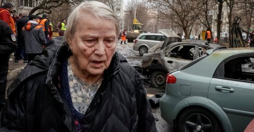 A resident walks at the site of a Russian drone strike, amid Russia's attack on Ukraine, in Kharkiv, Ukraine, March 25, 2026. (Reuters Photo)