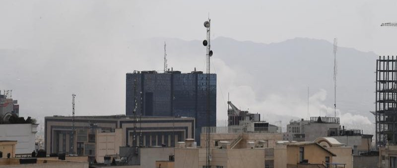 Thick smoke rises in downtown Tehran, Iran, Feb. 28, 2026. (DHA via Xinhua)