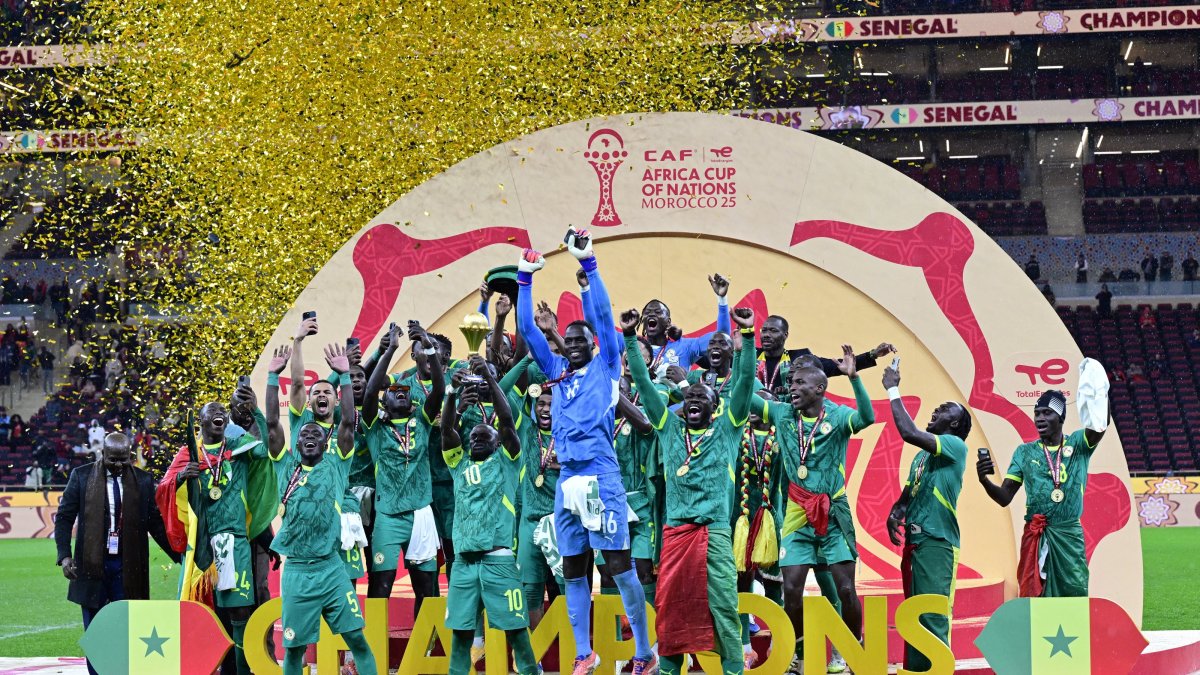 Senegal players celebrate with the trophy after winning the CAF Africa Cup of Nations 2025 final match between Senegal and Morocco, Rabat, Morocco, Jan. 18, 2026. (EPA Photo)