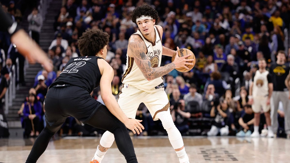 Golden State Warriors' Gui Santos (R) looks for an opening against Brooklyn Nets' Jalen Wilson during the second half at Chase Center, San Francisco, U.S., March 25, 2026. (AFP Photo)