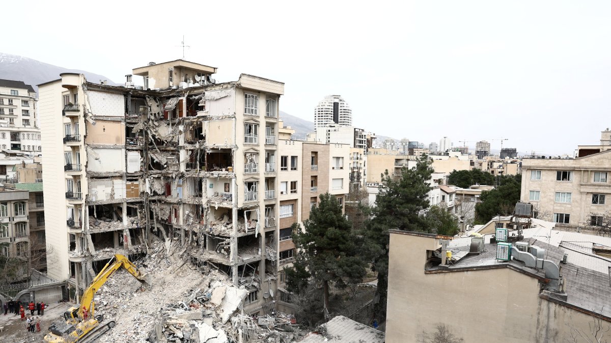 A view of a residential building that was damaged by a strike, amid the U.S.-Israeli conflict with Iran, Tehran, Iran, March 23, 2026. (Reuters Photo)